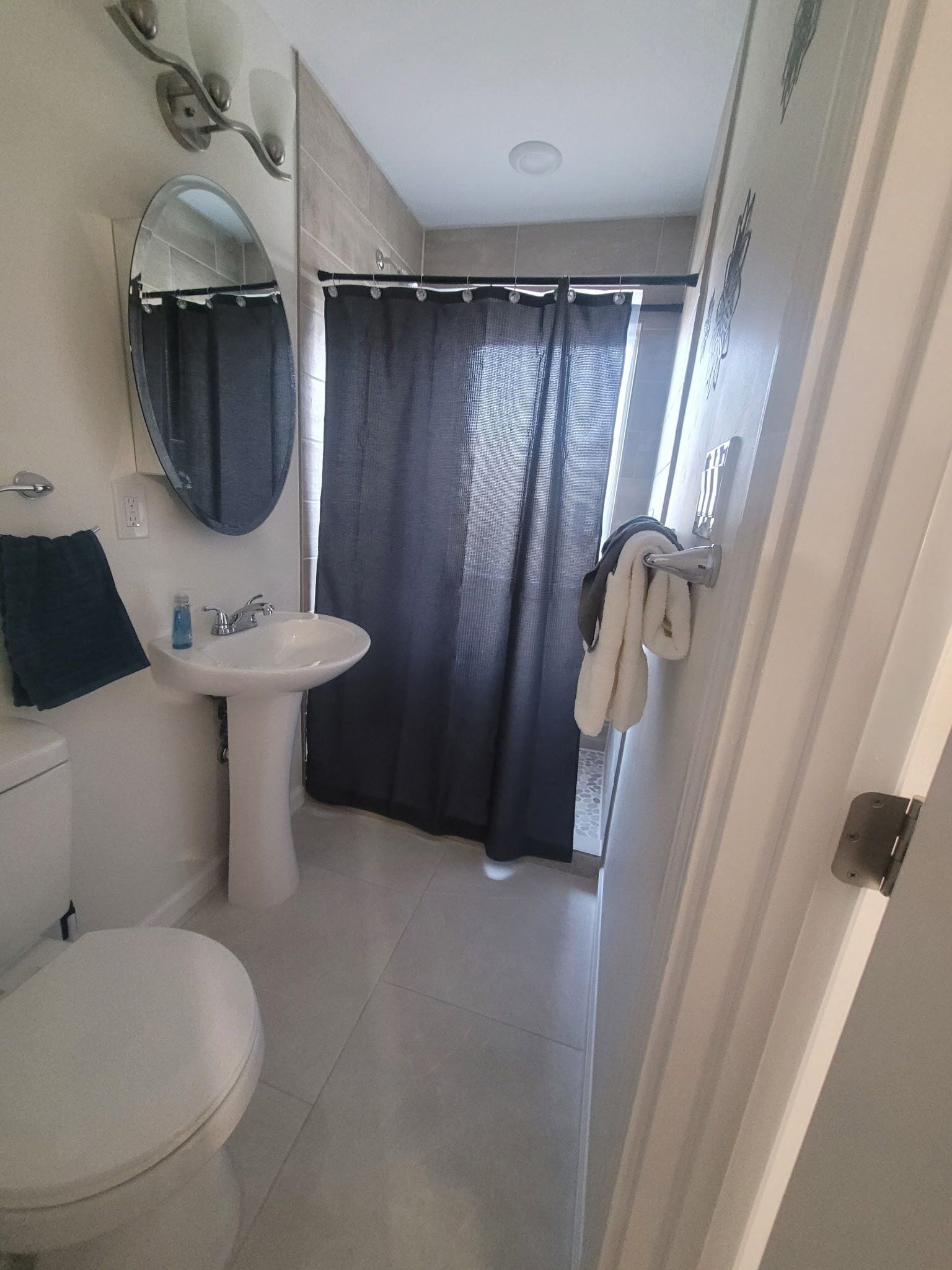Shower, towels, soap, toilet paper