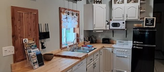 New tiny home in an incredible private setting among all nature has to offer.