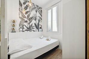 1 dormitorio, tabla de planchar con plancha, wifi y ropa de cama
