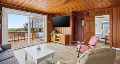 Experience ocean views at B'More Chill, a spacious 5-bedroom home in Oak Island.