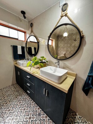 Shower, towels, soap, toilet paper