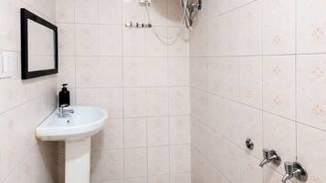 Deluxe Double Room, Multiple Beds | Bathroom | Shower, rainfall showerhead, free toiletries, slippers