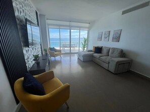Apartment, 3 Bedrooms, Balcony, Garden View | Living room