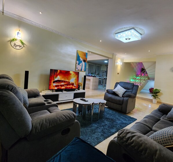 Family Bungalow | Living area | 32-inch Smart TV with digital channels