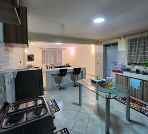 Fridge, microwave, cookware/dishes/utensils