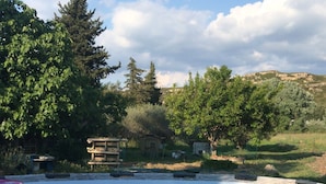 A swimming pool with a stone wall and a sign that reads "Bestway Steel Pro MAX". - Country house in Provence (Istres)