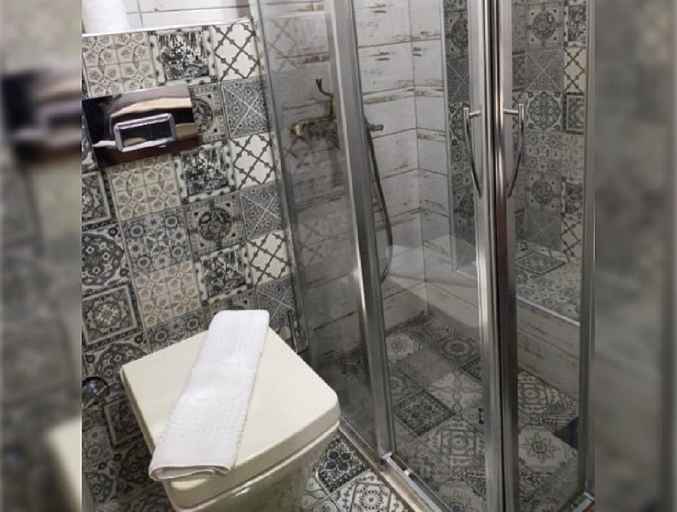 Shower, eco-friendly toiletries, hair dryer, slippers