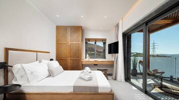 3 dormitorios, tabla de planchar con plancha, cuna de viaje