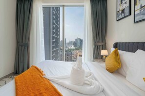 3 chambres, coffres-forts dans les chambres, fer et planche à repasser