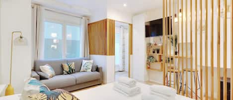 Apartment | Laptop workspace, iron/ironing board, bed sheets