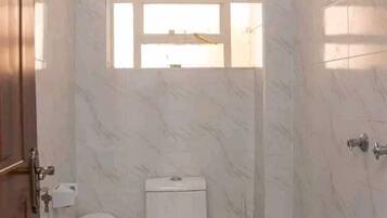 Classic Apartment, City View | Bathroom | Shower, free toiletries, slippers, towels