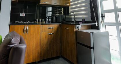 Tanzi Homes Sherura