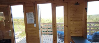 Bunkie with spectacular view, peaceful setting, and close to amenities.
