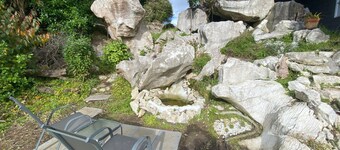 Private studio with your own waterfall garden and 5 minute walk to Hospital