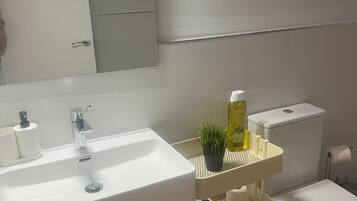 Standard Studio | Bathroom | Shower, hair dryer, towels, soap