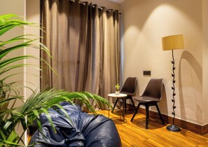 In-room safe, desk, laptop workspace, blackout curtains - Housr Golf Course Road Phase 1 Metro (Gurugram)