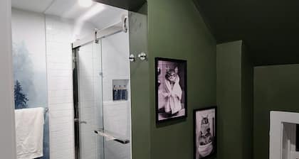 This is a private second-floor suite with its own entrance.