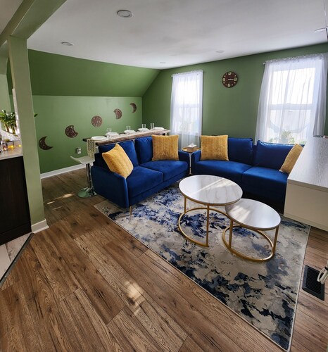 This is a private second-floor suite with its own entrance.