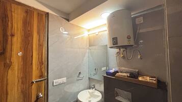 Studio, City View | Bathroom | Shower, free toiletries, slippers, towels