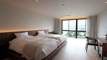 Habitación, vista al océano | Escritorio, wifi gratis y ropa de cama