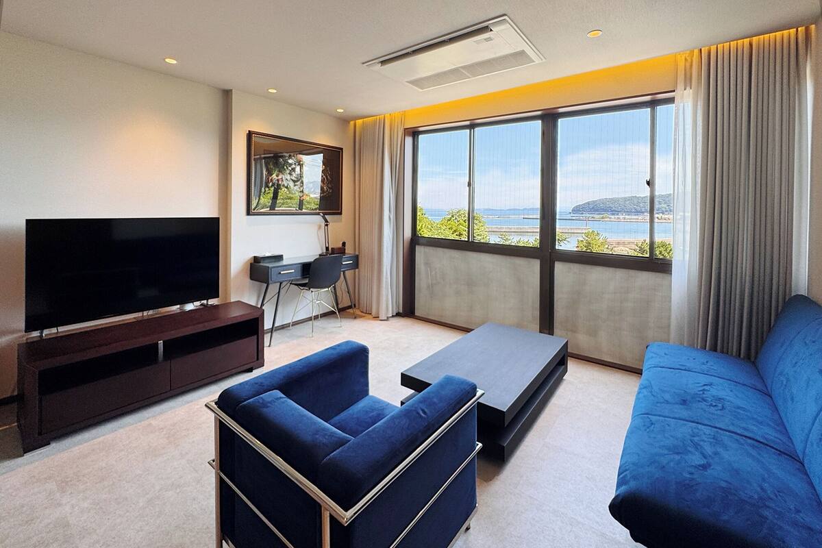 Suite Junior, vista oceano | Una scrivania, Wi-Fi gratuito, lenzuola