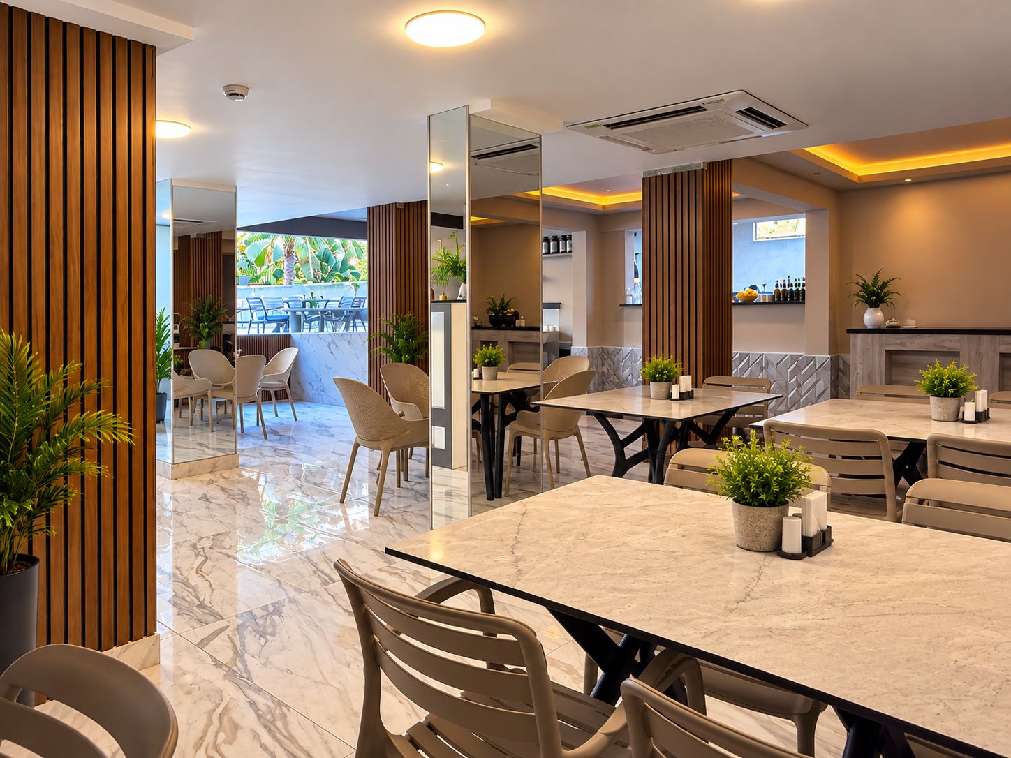 A modern dining area with marble flooring, wooden paneling, and multiple tables and chairs.