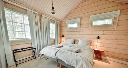 Rantamökki offers a compact accommodation for two people, right by the water.