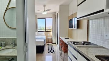 Apartamento básico | Wi-Fi de cortesia, roupa de cama