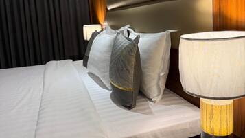 Premium bedding, down duvets, pillow-top beds, desk