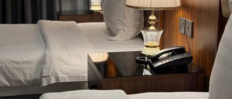 Premium bedding, down comforters, pillowtop beds, desk