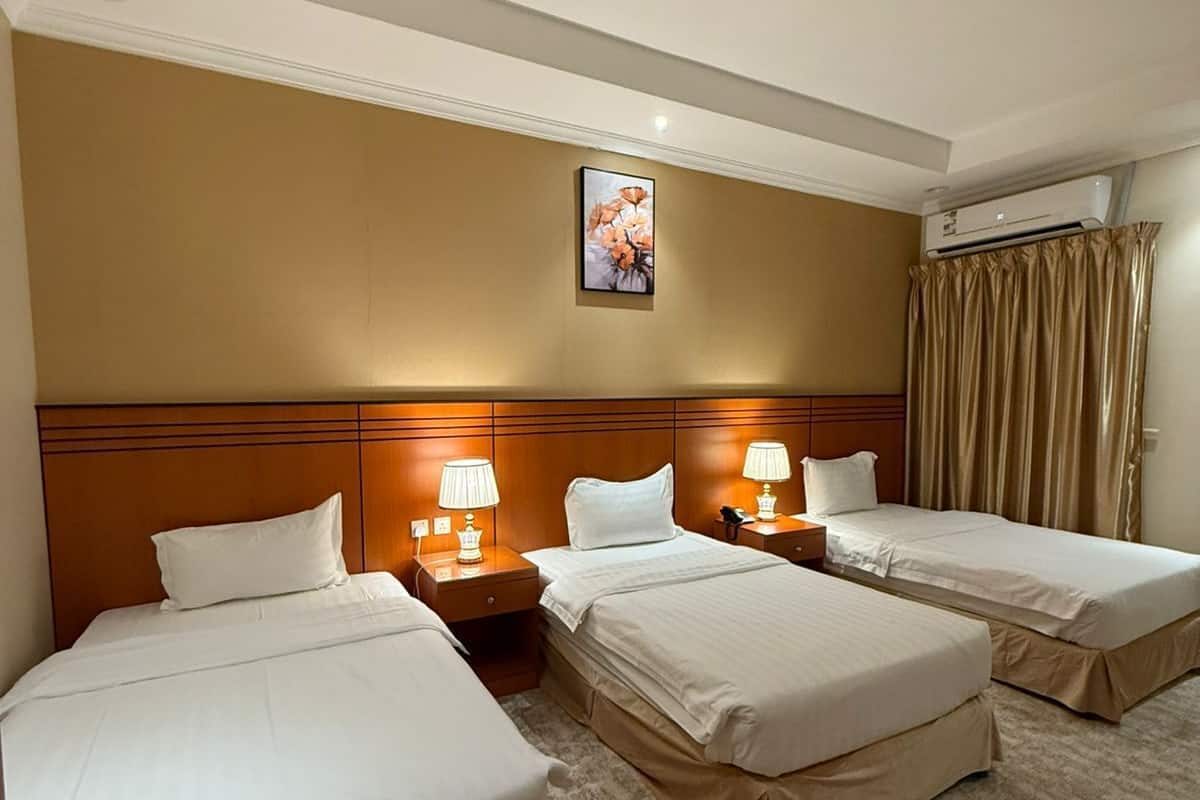 Deluxe Triple Room | Premium bedding, down comforters, pillowtop beds, desk