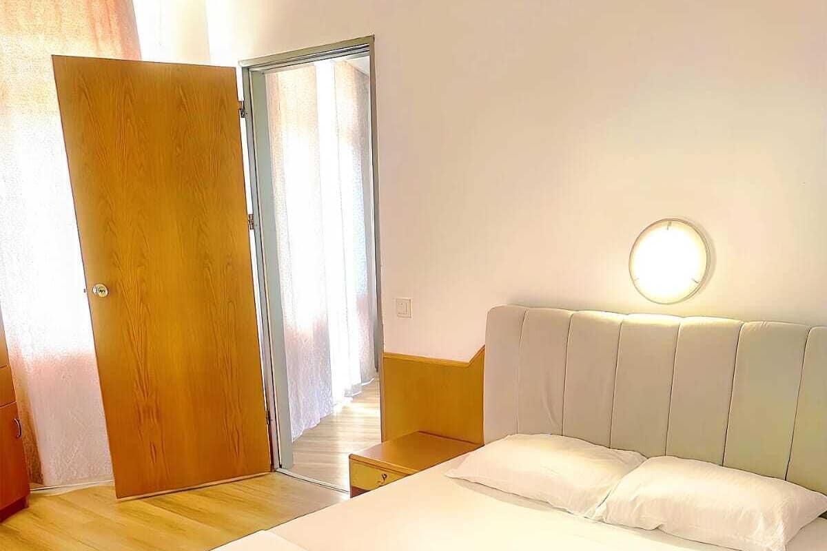 Family Room, Balcony, Sea View | Free minibar, laptop workspace