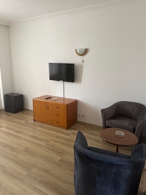 Family Room, Balcony, Sea View | Free minibar, laptop workspace