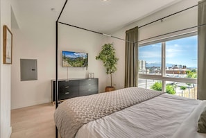 1 bedroom, desk, iron/ironing board, travel crib