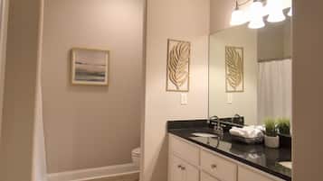 Hair dryer, towels, soap, toilet paper