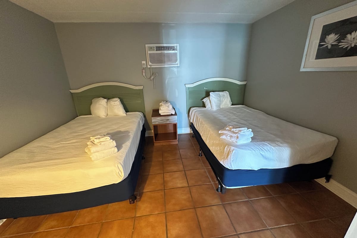 2 Full Beds With Sofa Bed Resort View | 1 dormitorio, wifi gratis, ropa de cama