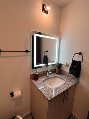 Hair dryer, towels, soap, shampoo