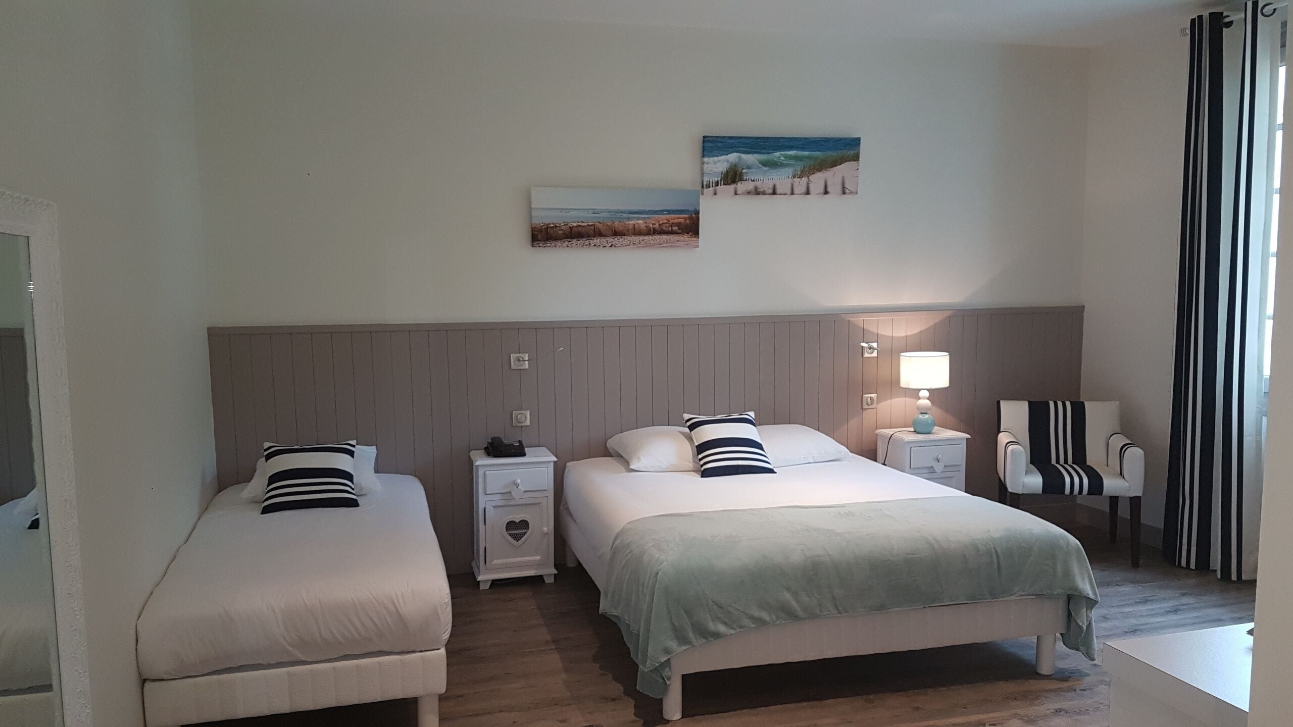 Chambre triple Confort, vue sur le jardin | Coffre-fort, accès au Wi-Fi (inclus)
