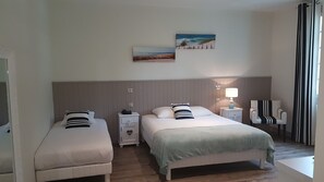 Comfort Triple Room, Garden View | In-room safe, free WiFi