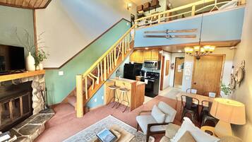 TV connectée, cheminée, table de tennis de table