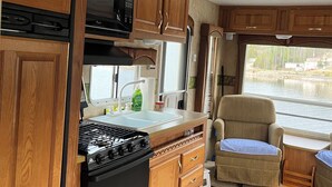 Coffee/tea maker, fridge, microwave, oven - RV By The Sea. 3 Rogers Cove Rd. Cobbs Arm, NL. You, the Ocean and Mother Nature (Cobbs Arm)