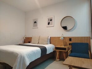 Chambre double | Système d’insonorisation, accès au Wi-Fi (inclus)