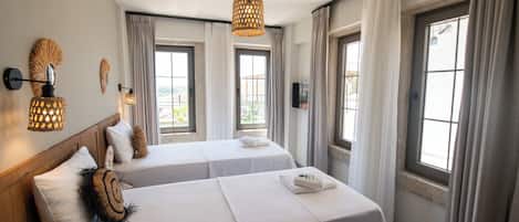Economy Twin Room, Garden View | Laptop workspace, free WiFi