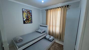 Apartamento | 2 quartos, Wi-Fi de cortesia, roupa de cama