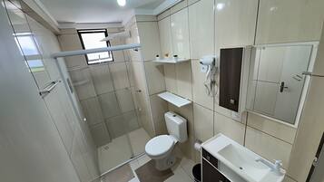 Basic Apartment | Bathroom | Shower, hair dryer, towels, soap