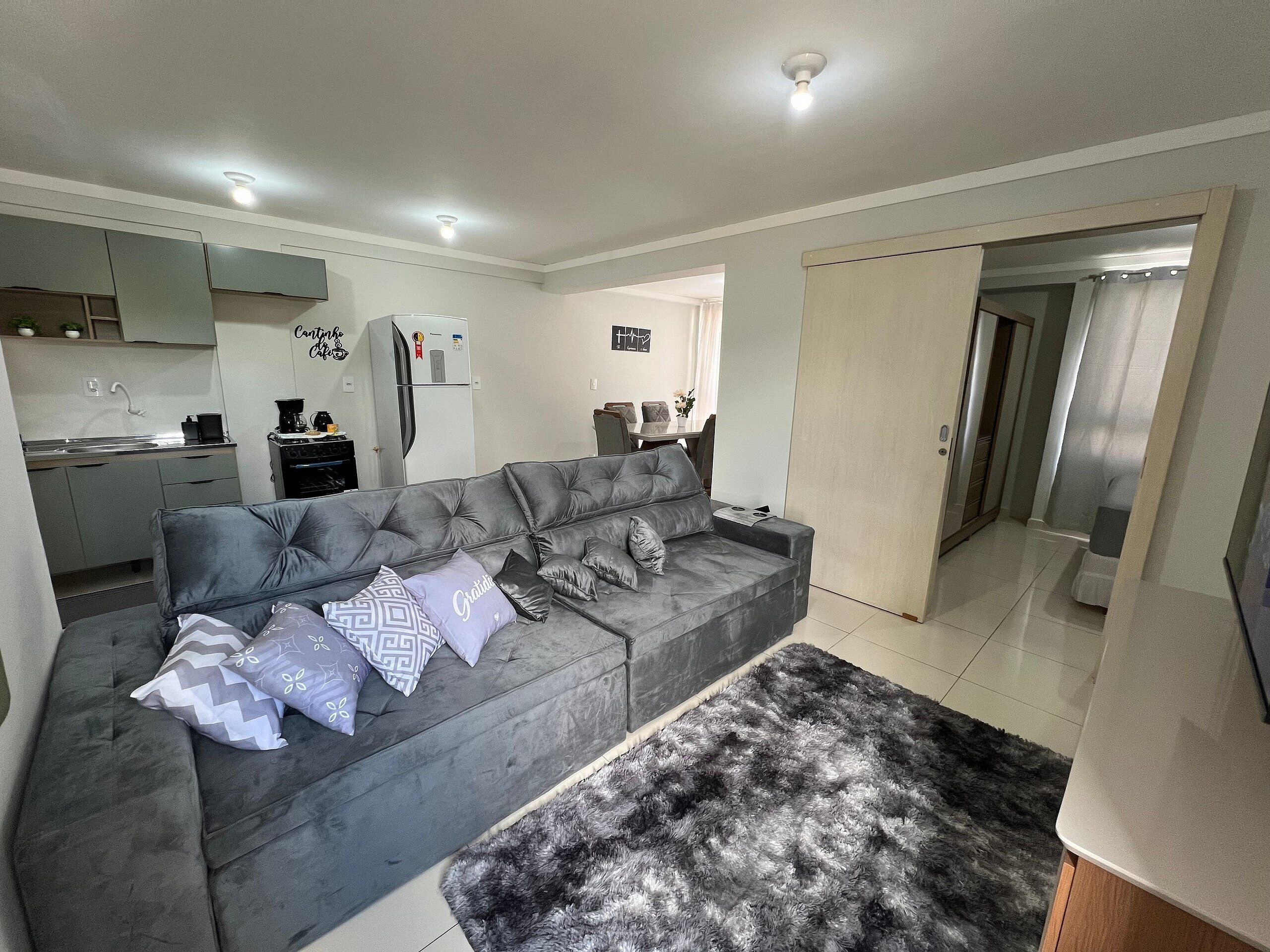 Apartamento básico | Área de estar | Smart TV 40 polegadas com canais digitais, Netflix