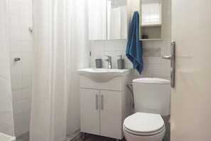 Hair dryer, towels, soap, toilet paper