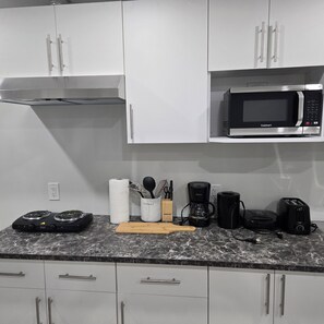 Fridge, microwave, coffee/tea maker, electric kettle