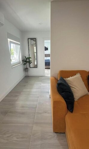 Apartamento, 2 quartos, para fumantes, terraço | Área de estar