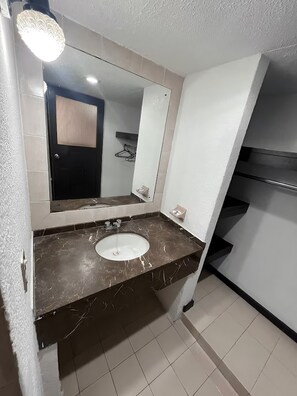 Shower, jetted bath, hair dryer, bidet